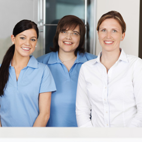 Dental team smiling