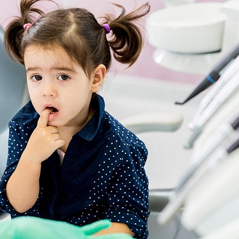 Little girl with tooth pain