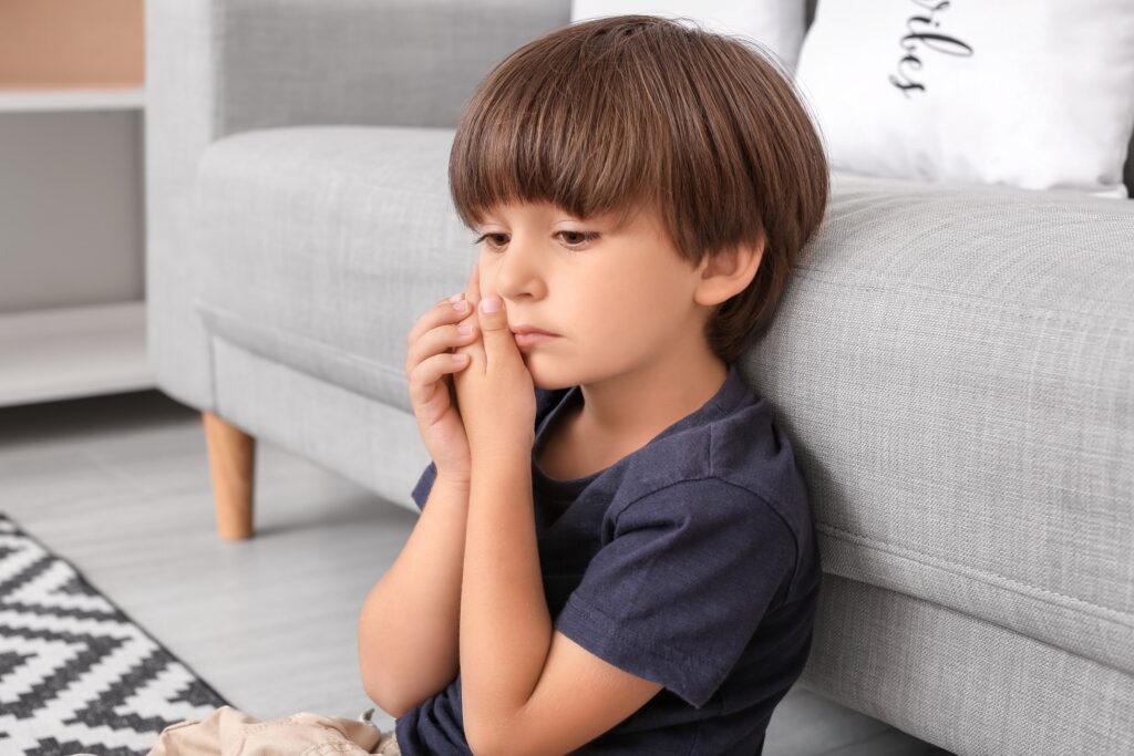 Child experiencing dental sensitivity at home