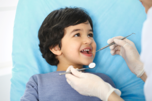 a young child visiting their dentist